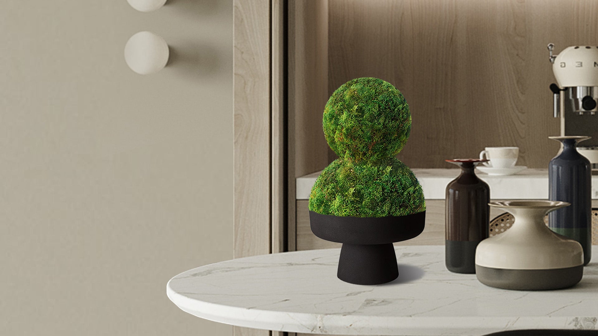 Small moss topiary pieces in modern cocktail table setting